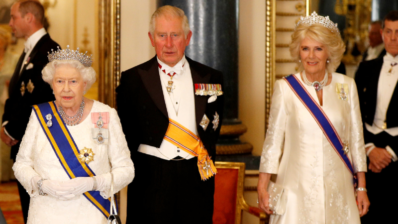 Queen Elizabeth, Prince Charles, and Camilla Parker Bowles welcome foreign dignitaries to England in a formal ceremony