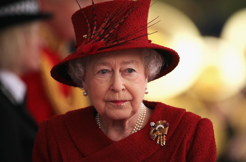 Queen Elizabeth in all red.
