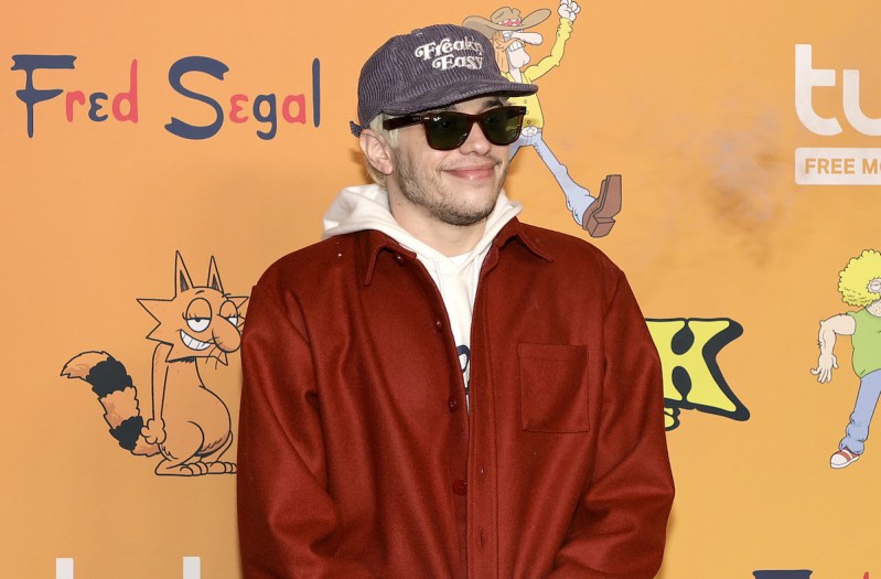 Pete Davidson in a red jacket