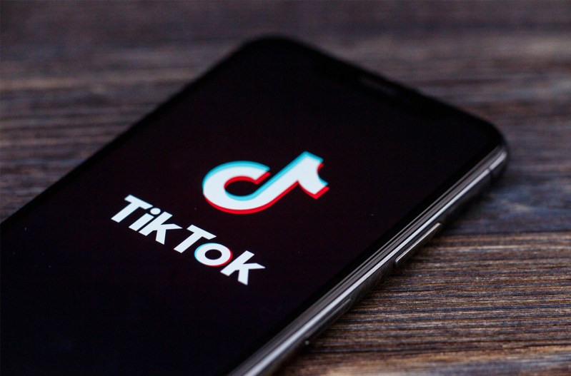 A phone with the TikTok app open