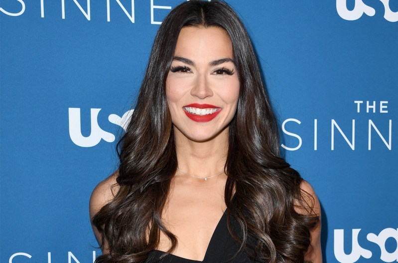 Erica Lugo in all black, smiling