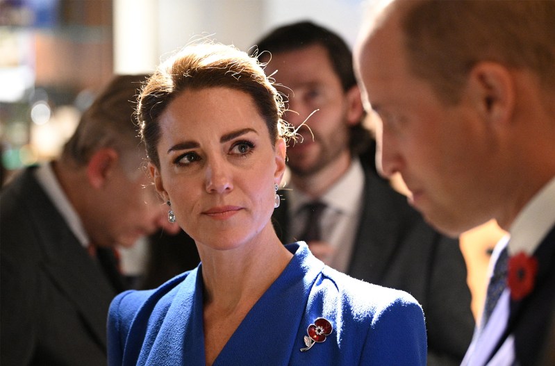 Kate Middleton looking at Prince William in the foreground