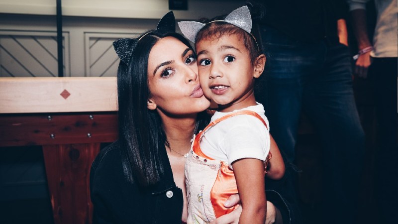 Kim Kardashian and daughter North West pose together while wearing cat ear headbands