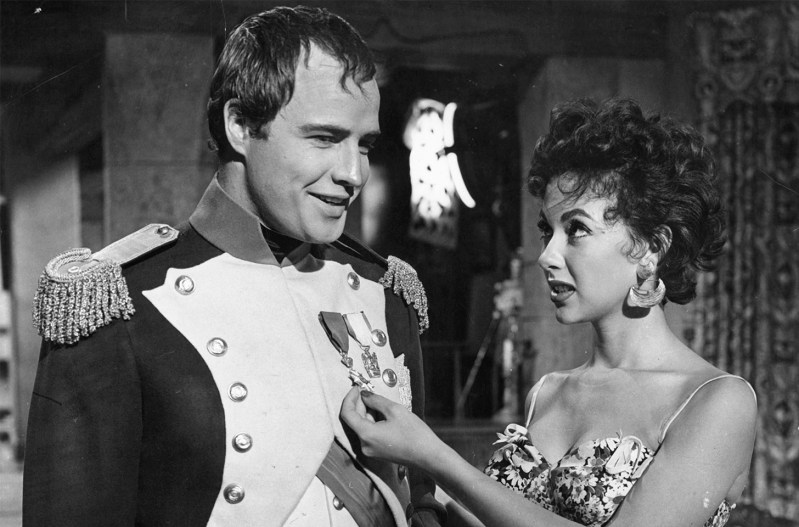 Marlon Brando on the left, Rita Moreno on the right on the set of "Desiree" in 1954