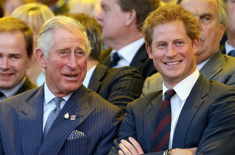 Prince Charles on the left, laughing with Prince Harry