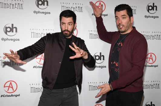 Drew Scott on the left, with Jonathan Scott on the right, in a funny pose
