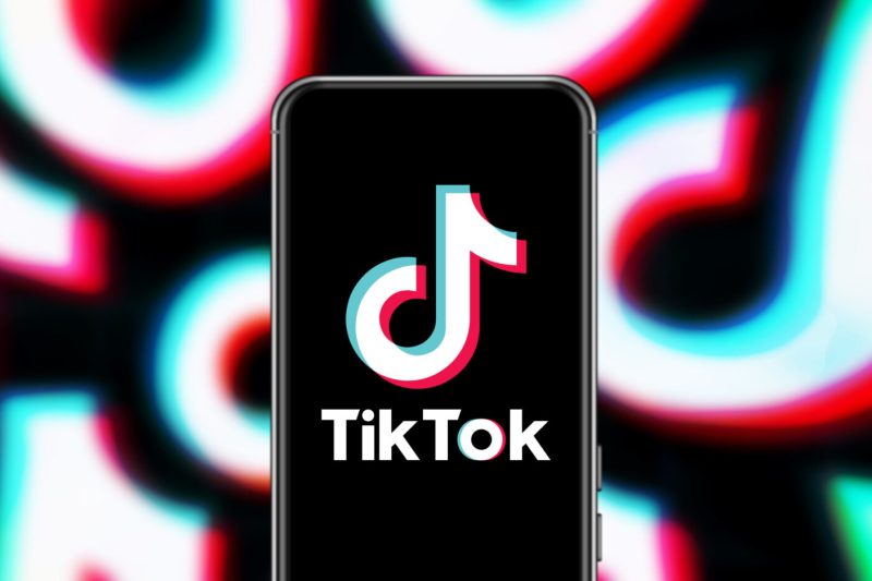 The TikTok logo with red and blue background