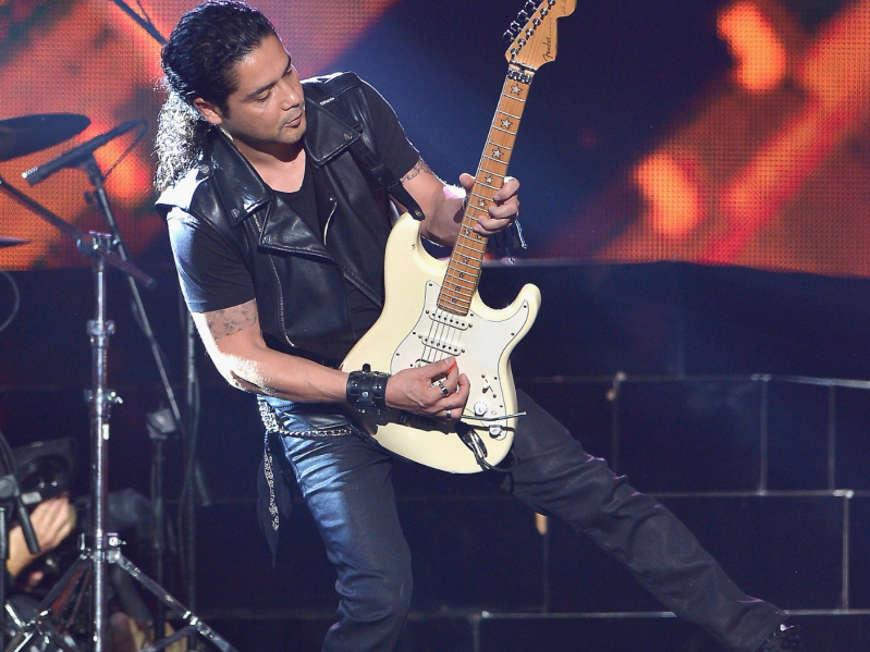 MIAMI, FL - APRIL 30: Chris Perez of Los Dinos performs musical tribute to Selena while performing with Jennifer Lopez onstage at the 2015 Billboard Latin Music Awards presented bu State Farm on Telemundo at Bank United Center on April 30, 2015 in Miami, Florida.