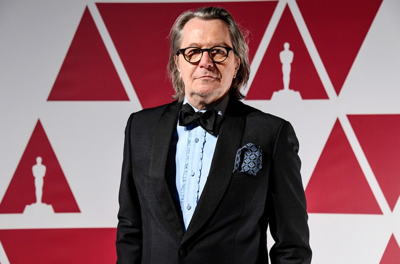 Gary Oldman in a tuxedo with long hair