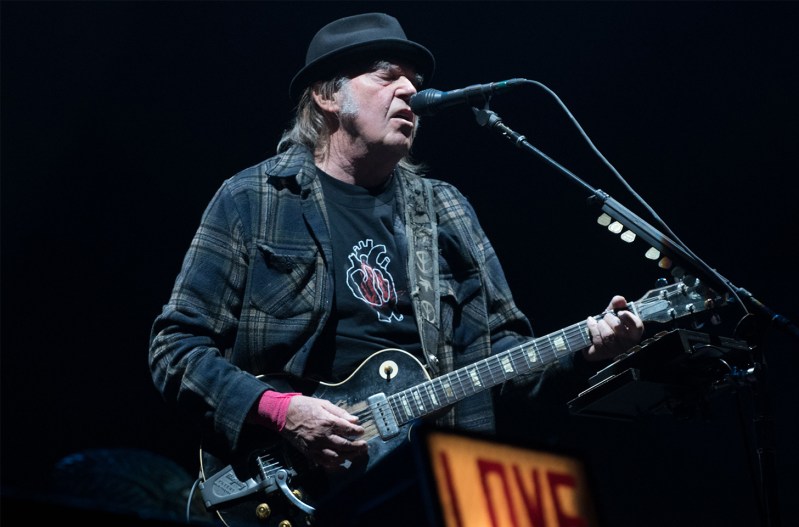 Neil Young, when he's not inventing things, plays guitar