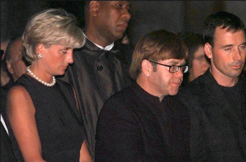 Elton John on the right, standing with Princess Diana