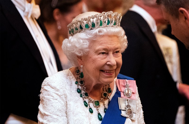 Queen Elizabeth wearing a tiara and smiling.