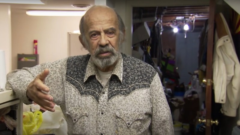 Seymour wears a gray shirt during his appearance on Hoarders: Buried Alive