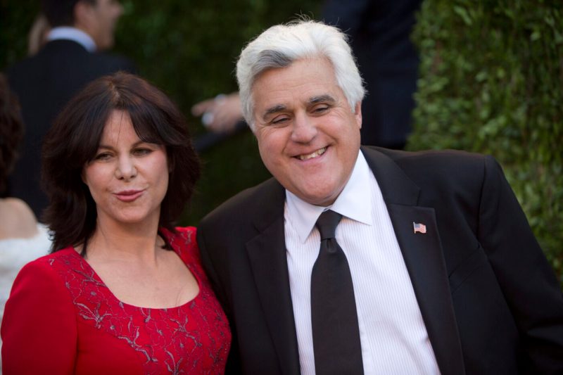 Jay Leno and his wife arrive for the 2013 Vanity Fair Oscar Party on February 24, 2013 in Hollywood, California. AFP PHOTO/ADRIAN SANCHEZ-GONZALEZ