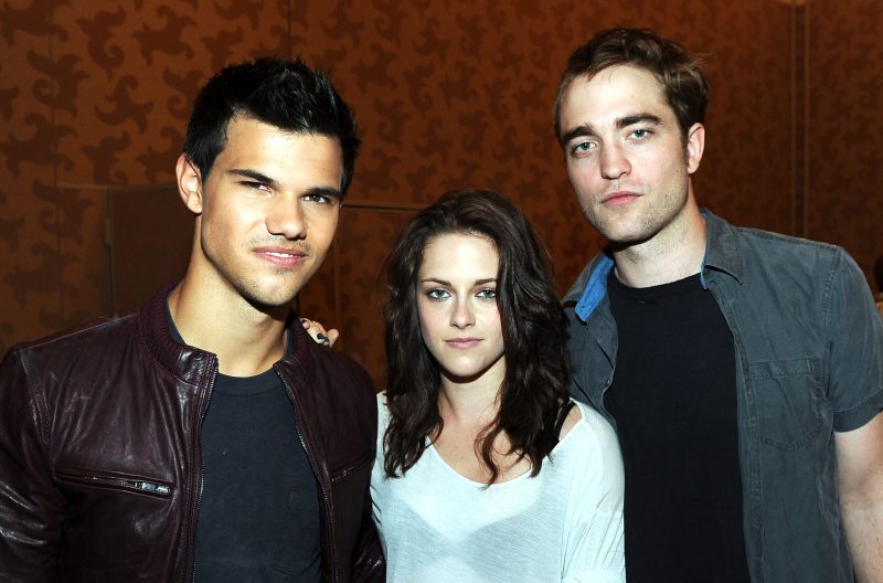 Taylor Lautner, Kristen Stewart, and Robert Pattinson at a press conferences for "Twilight: Breaking Dawn - Part 1"
