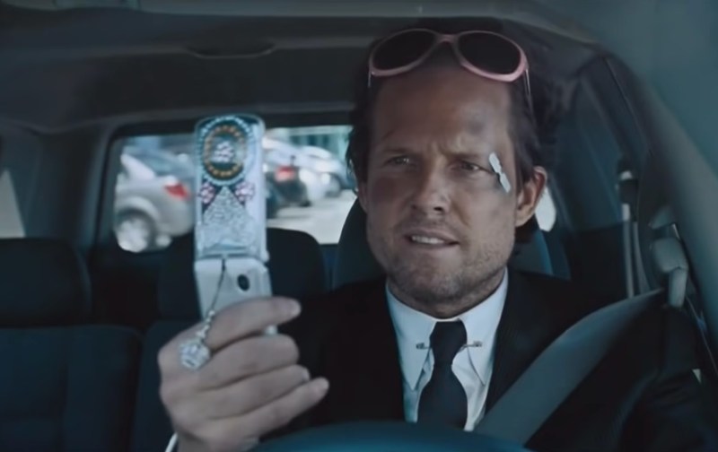 Dean Winters in character as Mayhem in an insurance commercial