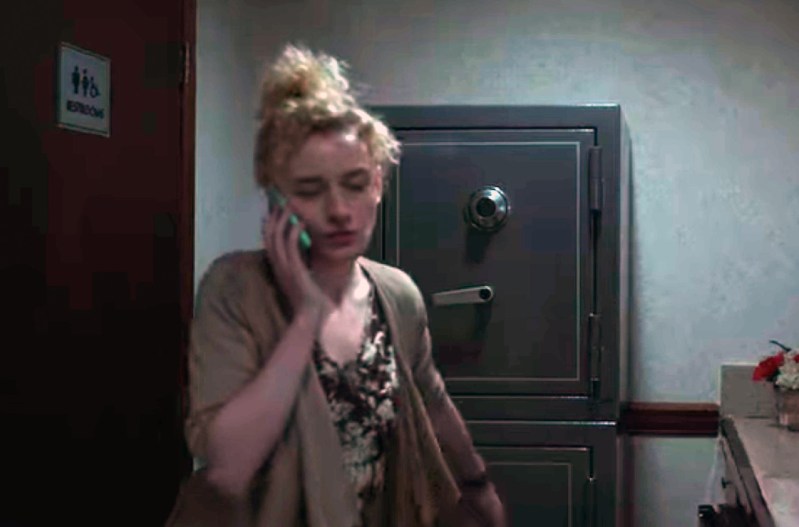 Julia Garner, as Ruth, speaks on the phone during a scene in Ozark