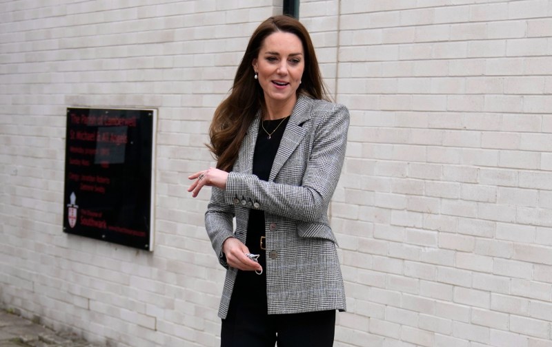 Kate Middleton wears a gray blazer over a black top and pants during a recent royal outing