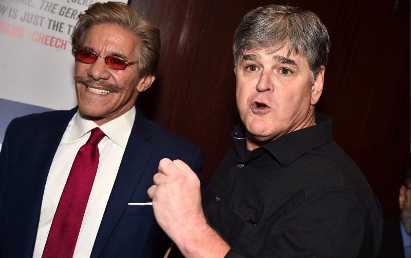 Geraldo Rivera and Sean Hannity pose together on the red carpet