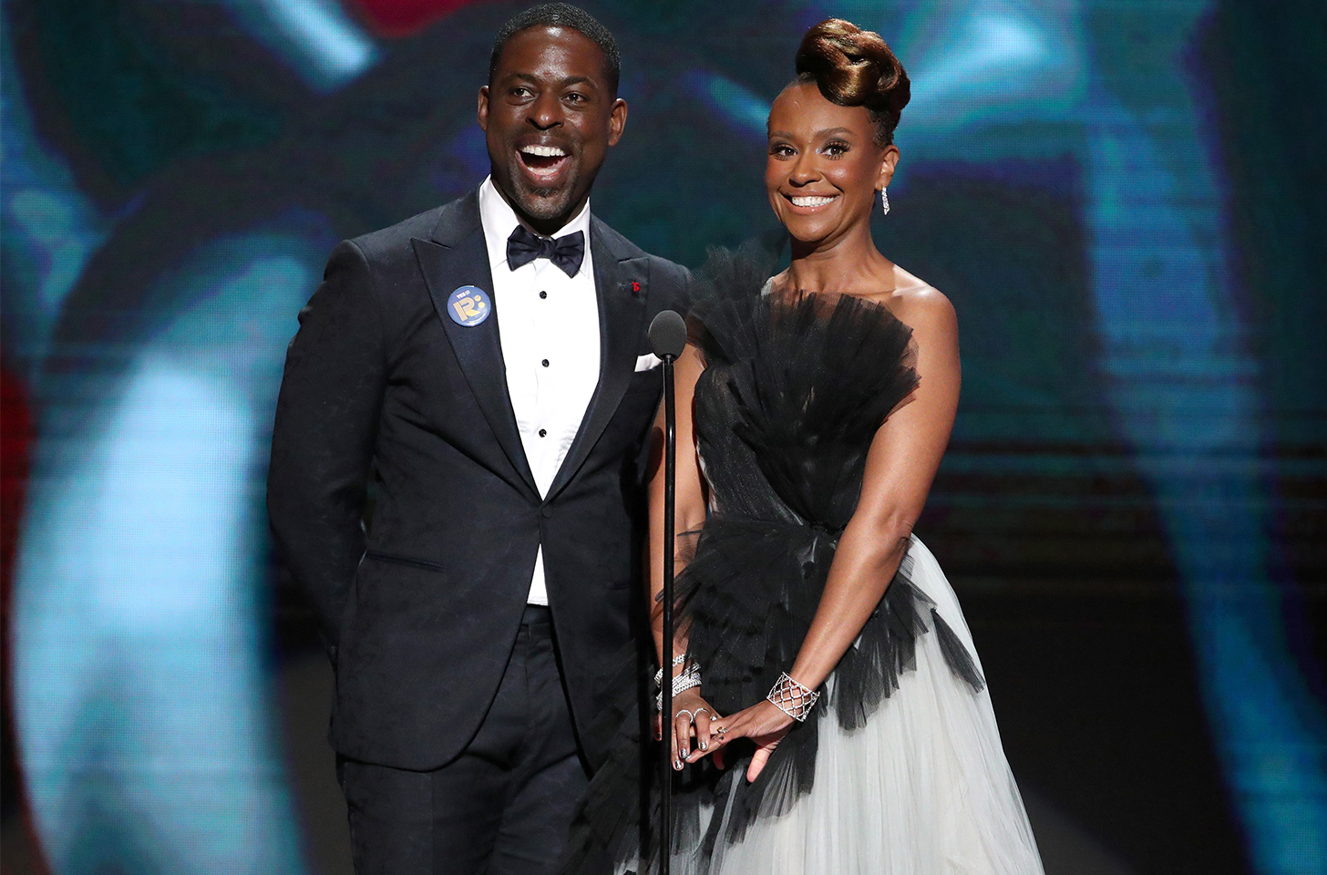 Sterling K. Brown (L) presenting award alongside Ryan Michelle Bathe