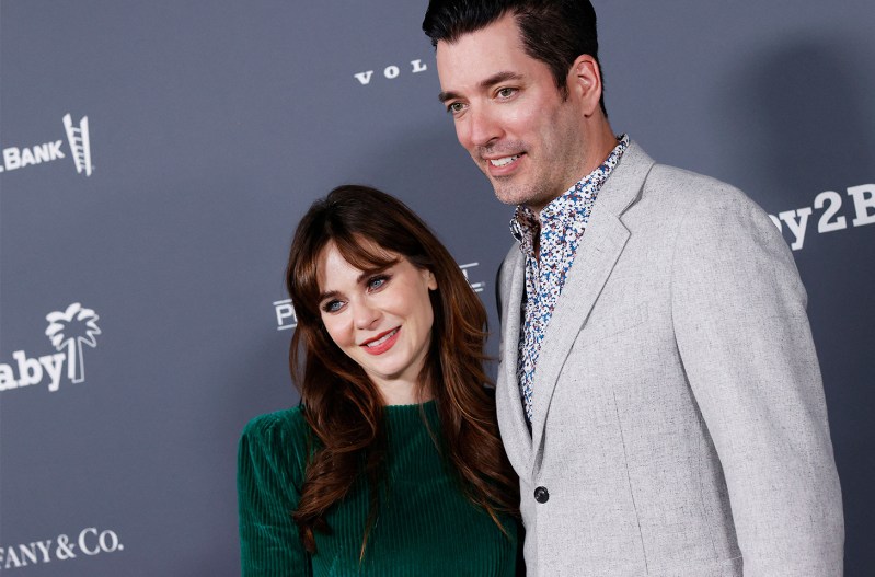 Zooey Deschanel on the left in green, standing with Jonathan Scott in a white suit