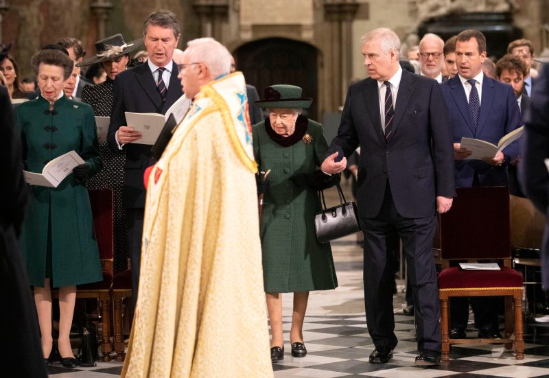 Queen Elizabeth being escorted into the thanksgiving service by Prince Andrew