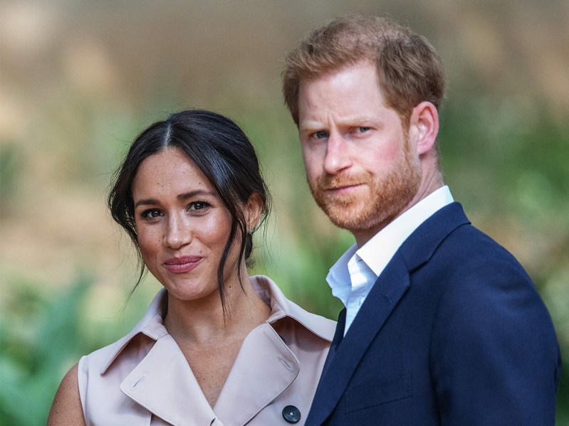 Britain's Prince Harry, Duke of Sussex(R) and Meghan, the Duchess of Sussex(L) arrive at the British High Commissioner residency in Johannesburg where they will meet with Graca Machel, widow of former South African president Nelson Mandela, in Johannesburg, on October 2, 2019