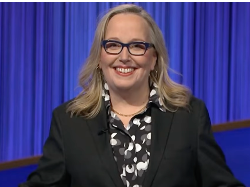 Maureen O'Neill smiles wearing black blazer