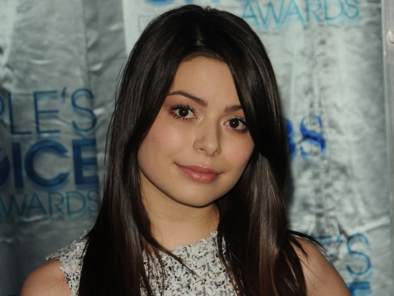 Miranda Cosgrove wearing white dress