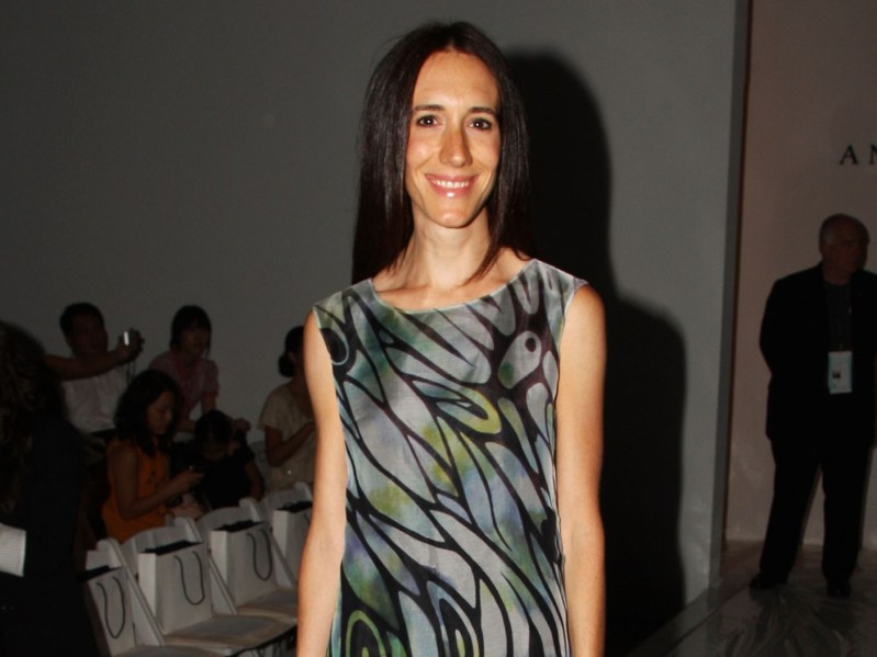 Rebekah Neumann smiling in patterned dress
