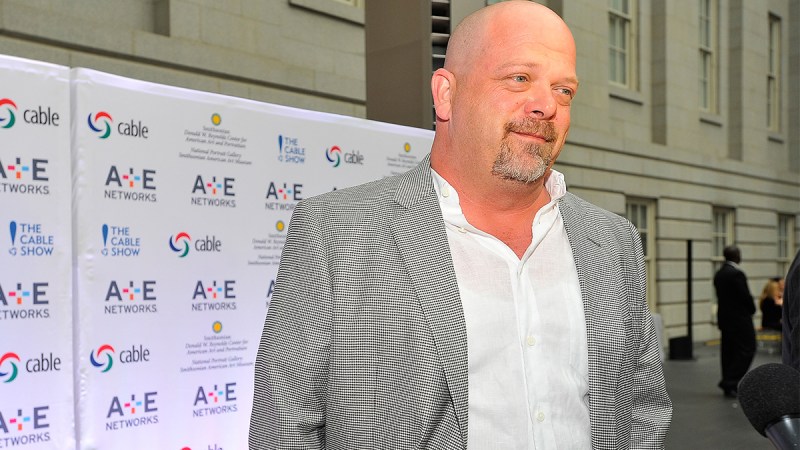 Rick Harrison with gray jacket and white shirt