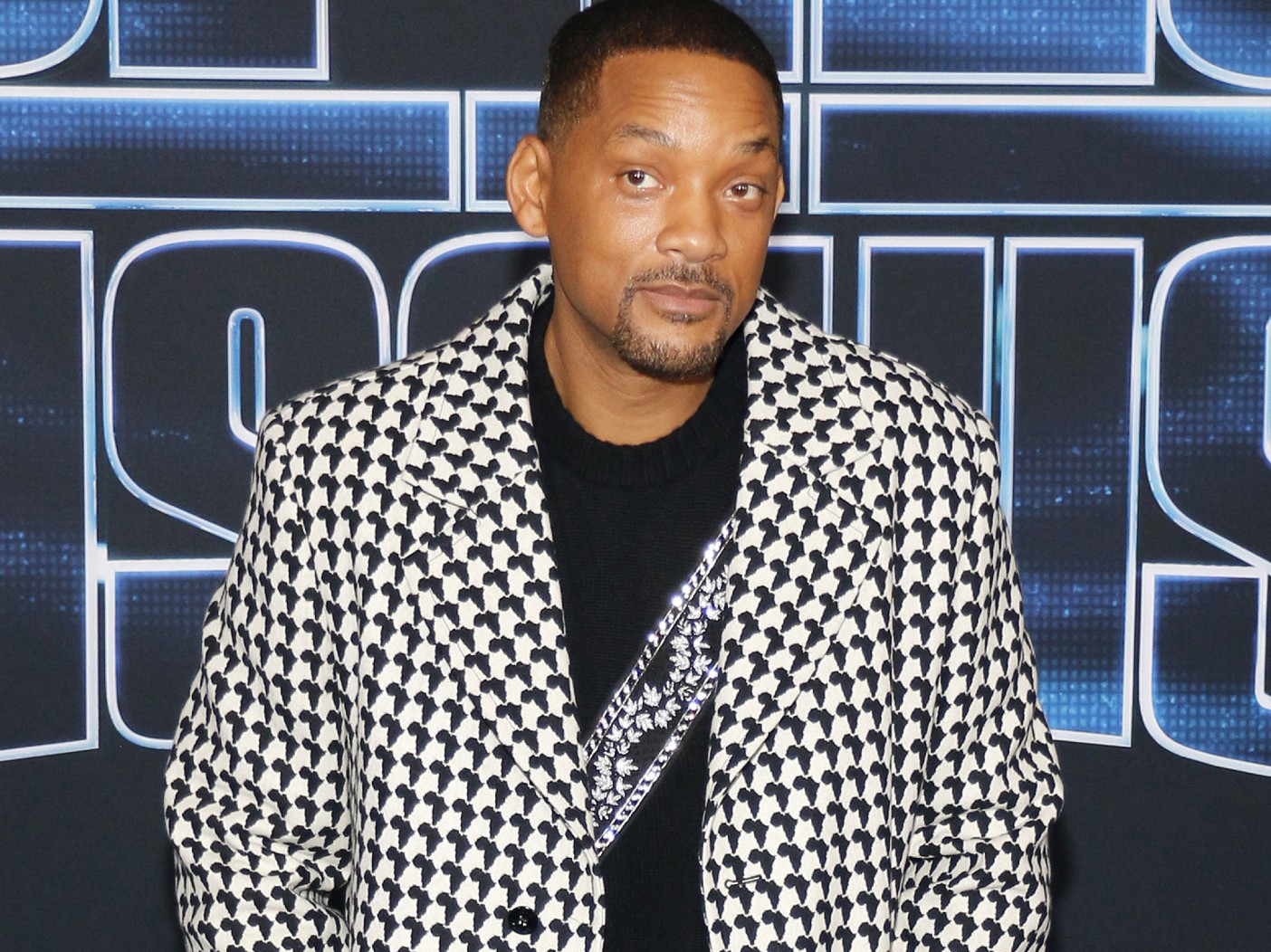 Will Smith weatin checkered jacket