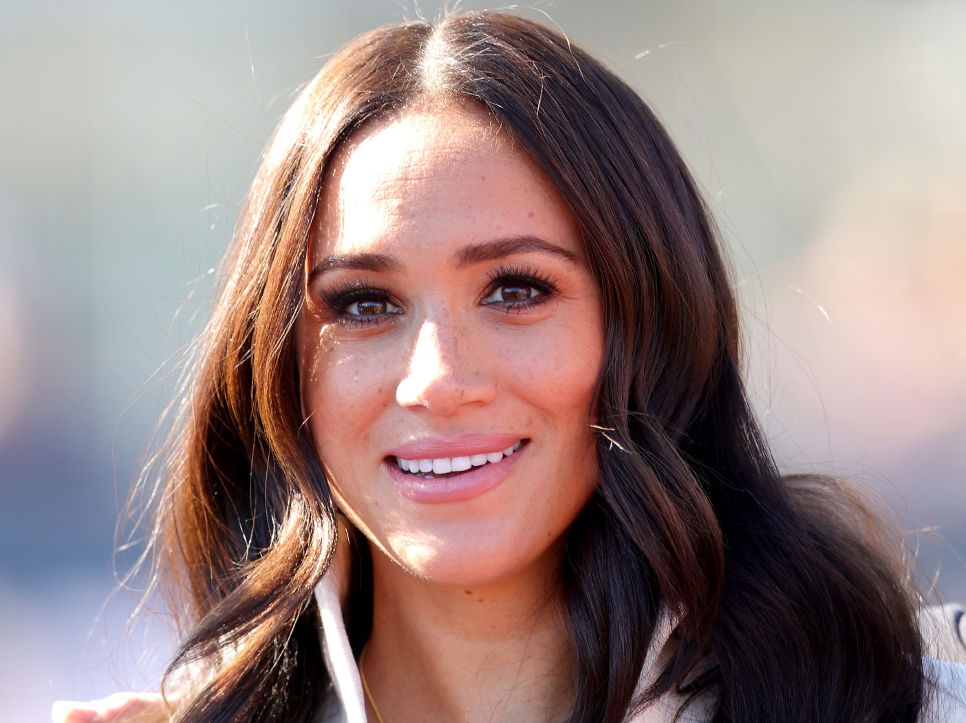 Closeup of Meghan Markle smiling outdoors