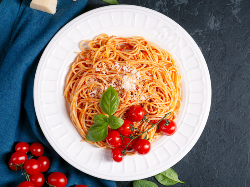 Plate of spaghetti with cherry tomatoes