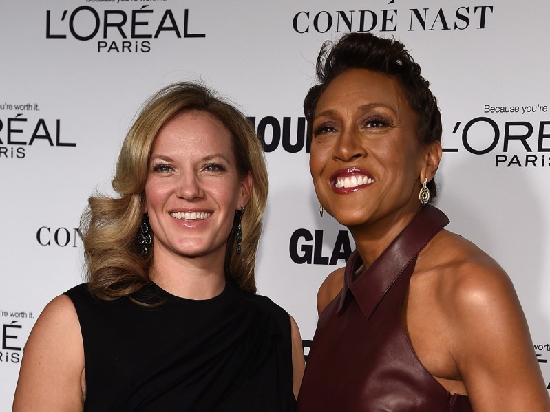 Amber Laign (L) and Robin Roberts (R) wearing black dresses