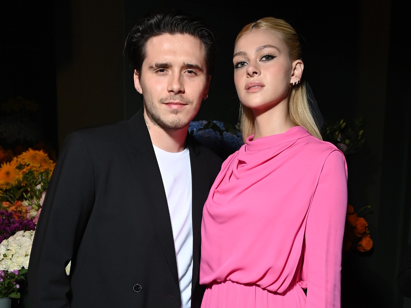 Brooklyn Beckham and Nicola Peltz dressed formally