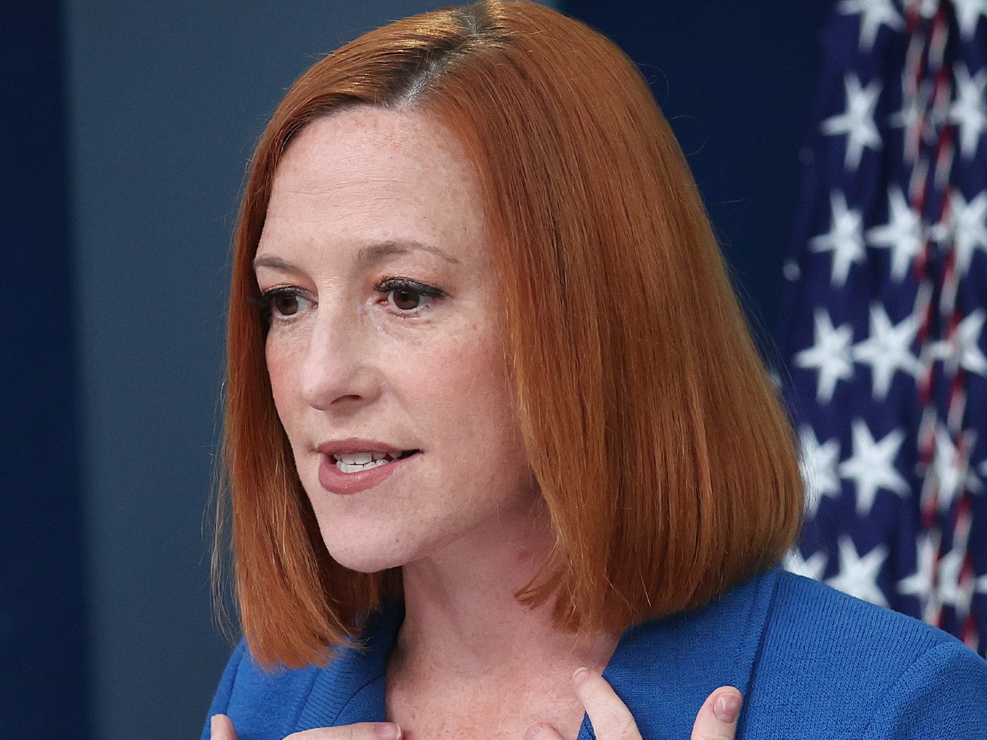 Closeup of Jen Psaki speaking off-camera
