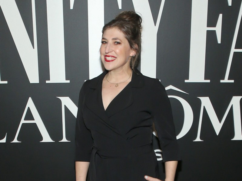 Mayim Bialik wearing black jumpsuit on red carpet