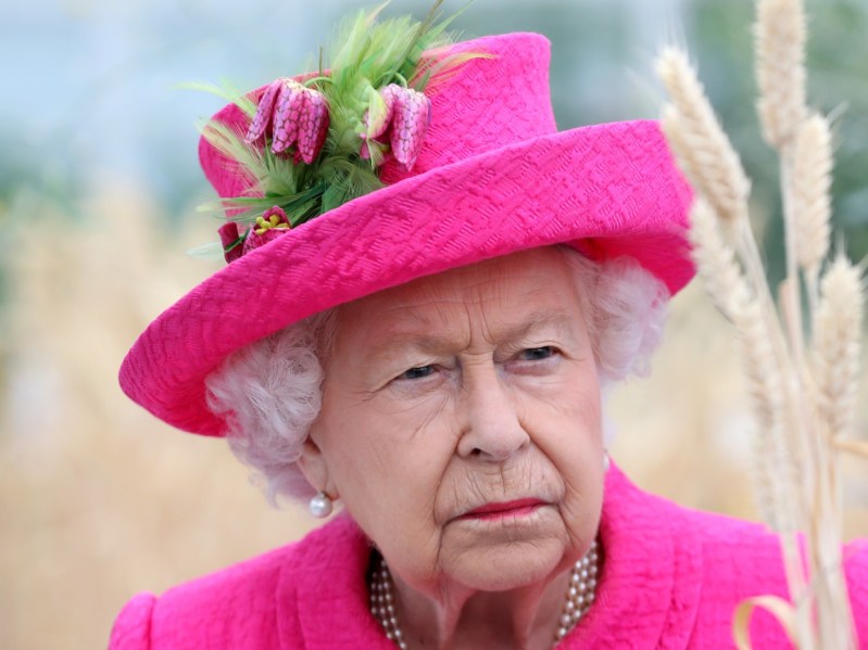 Queen Elizabeth in hot pink outfit and hat