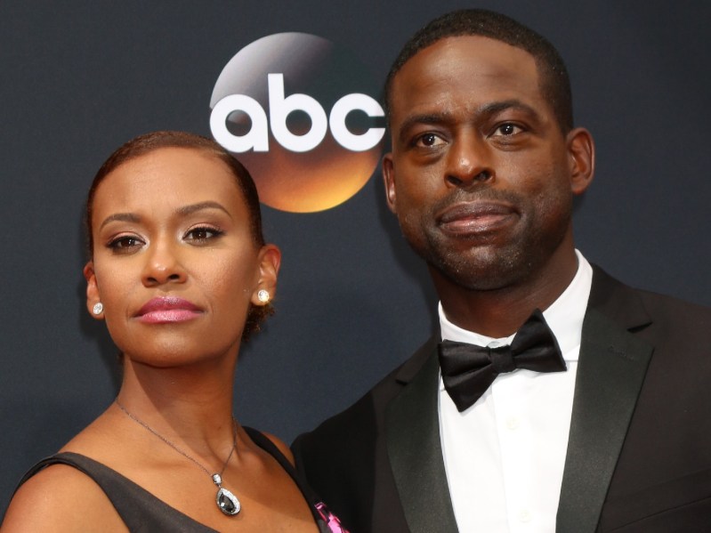 Ryan Michelle Bathe (L) and Sterling K. Brown (R) dressed in black on the red carpet