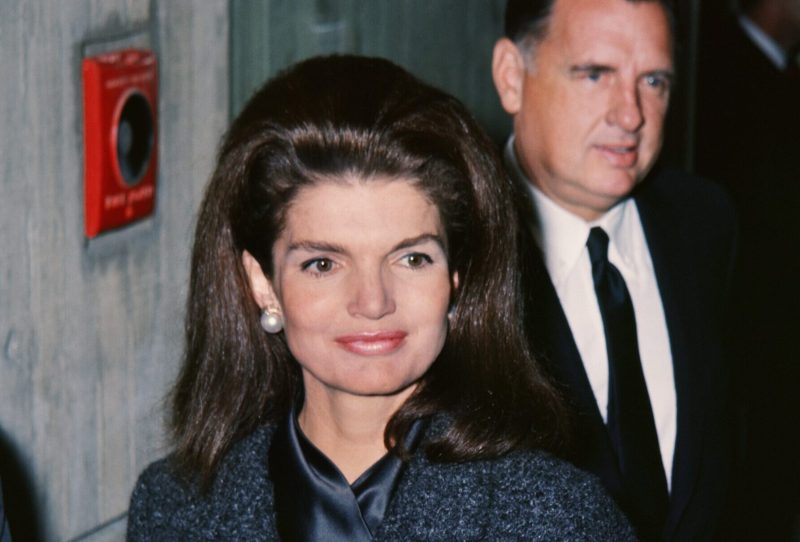 Jackie Kennedy in a navy tweed coat, image circa late 1960s.
