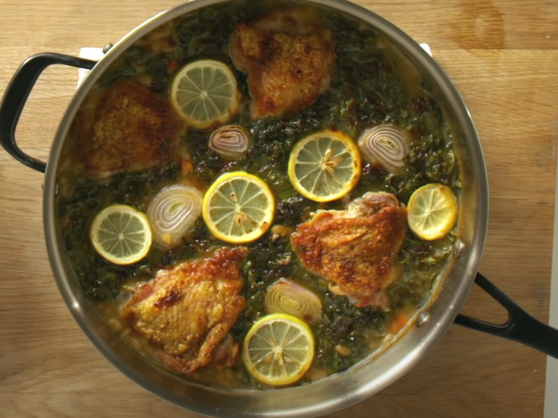 The finished dish of roasted chicken thighs with beans and kale made with Campbell's Bean and Bacon soup.