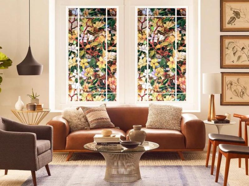 Living room with stained glass decorative film over the windows