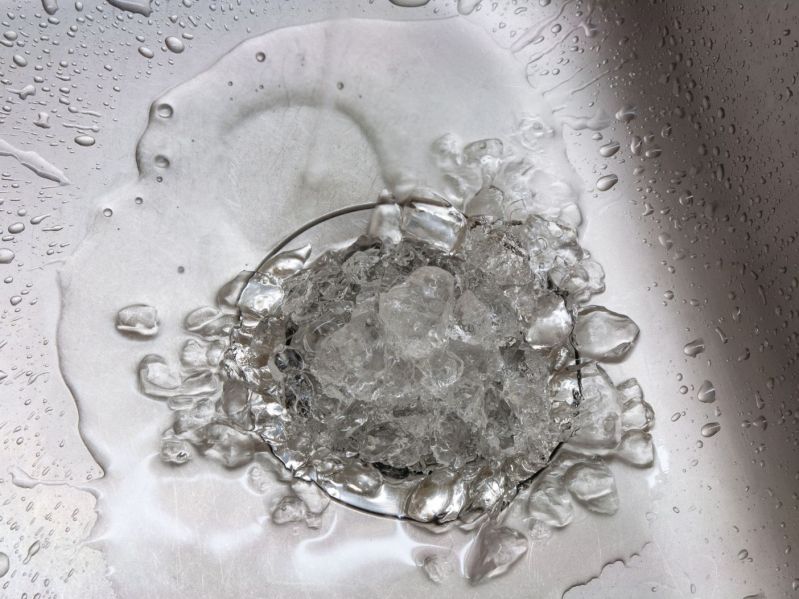ice in the drain of a kitchen sink