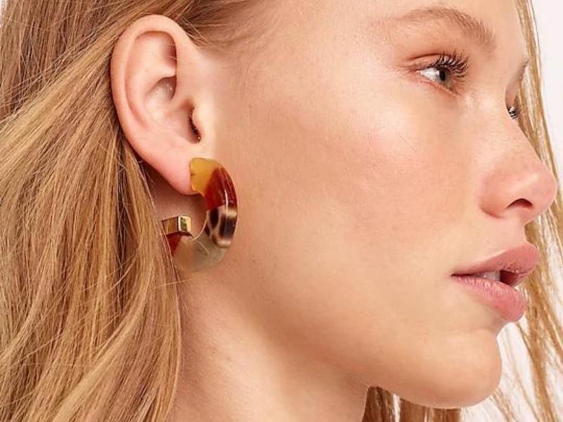 Woman wearing J.Crew's Made-in-Italy mixed acetate hoop earrings