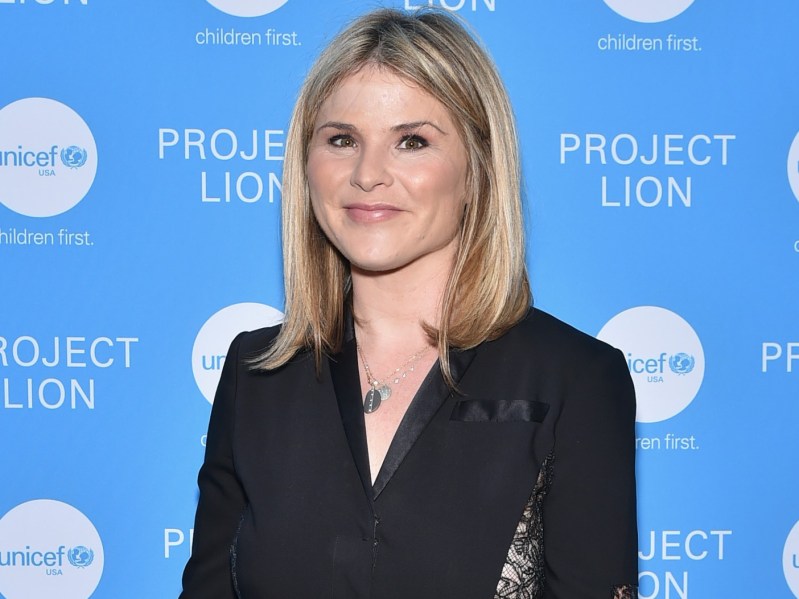 Jenna Bush Hager wears a black blazer against a sky blue background