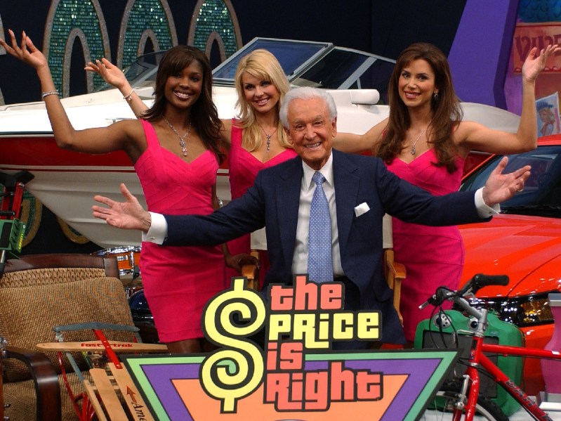 Bob Barker poses with three Price Is Right models, Lanisha Cole, Shane Stirling and Brandi Sherwood