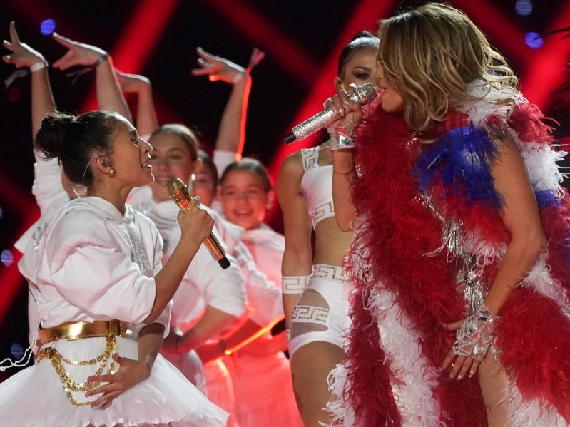 Jennifer Lopez and her child Emme perform onstage at the 2020 Super Bowl