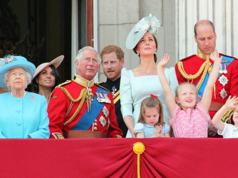 Queen Elizabeth and members of her family stand on the royal balcony