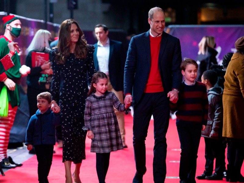 (L-R) Princes Louis, Kate Middleton, Princess Charlotte, Prince William, and Prince George on the red carpet